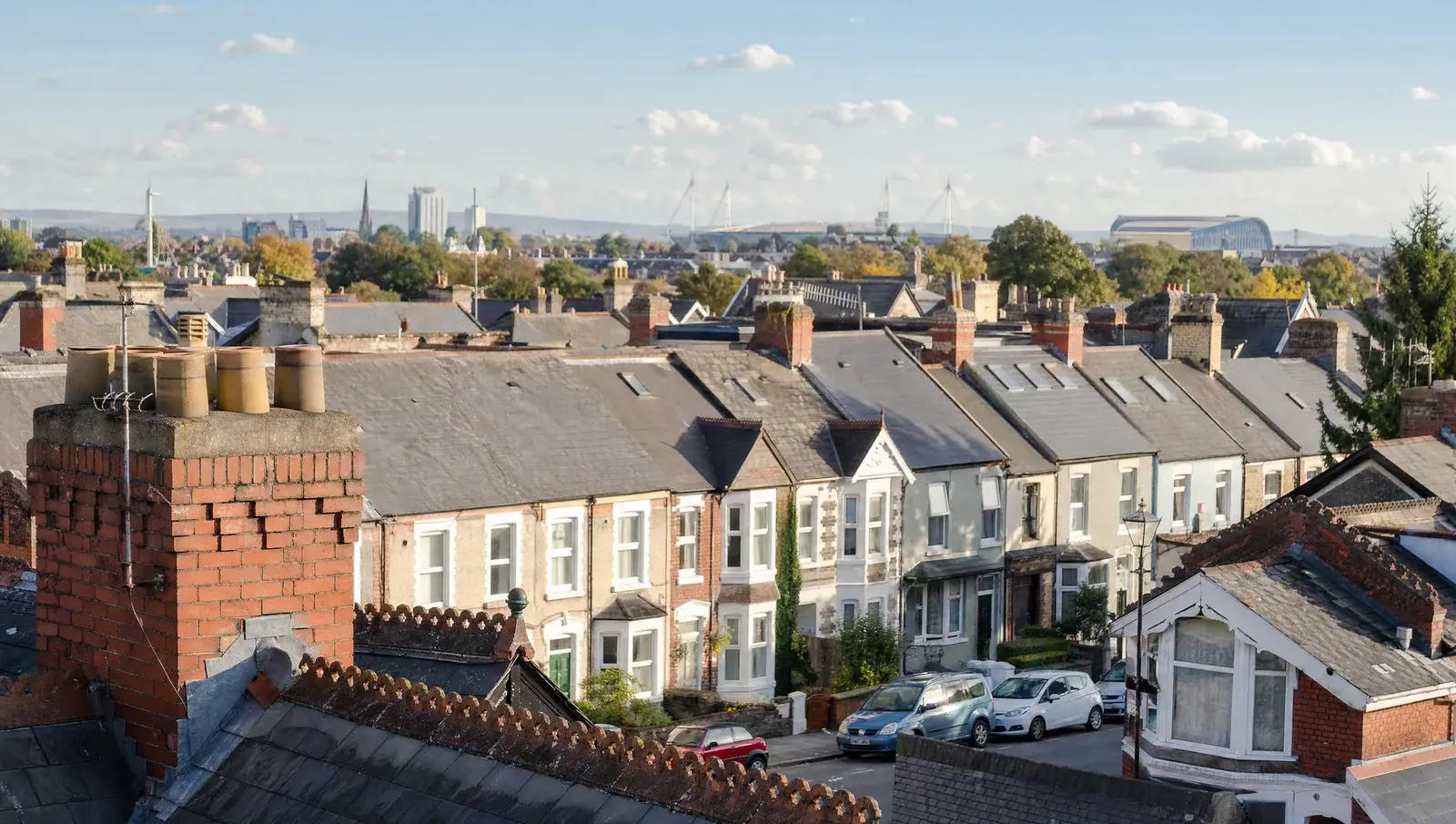 Cardiff Victorian terraced rooftops with Welsh slate roofs and brick chimney stacks