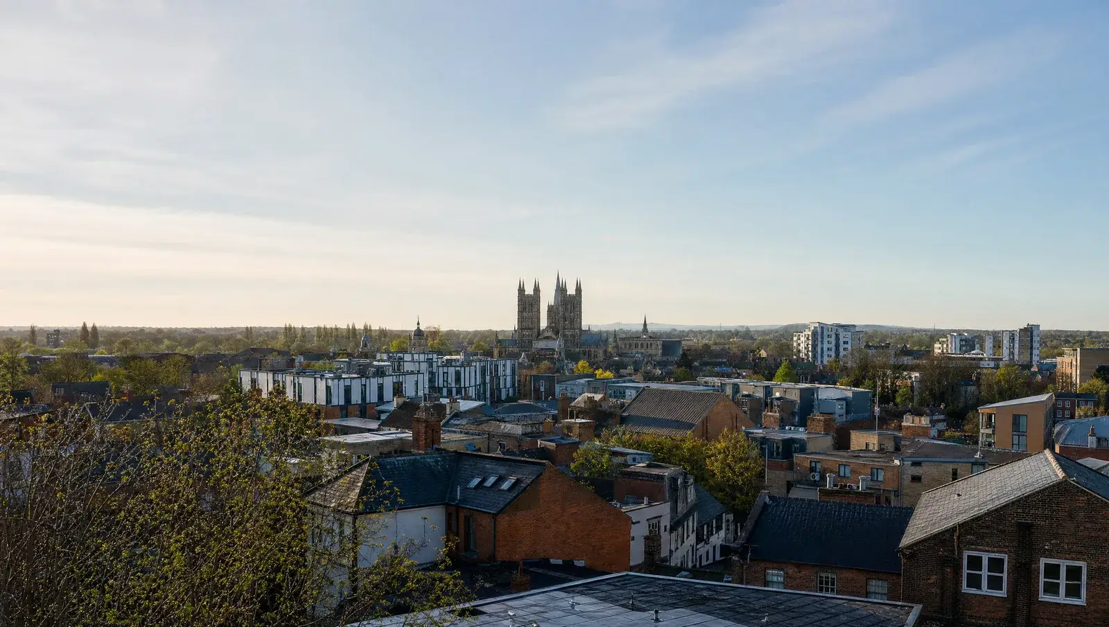 Peterborough rooftops with the cathedral towers rising in the distance