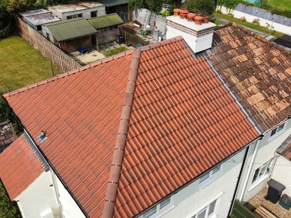 Aerial view of a red tiled hipped roof on a semi-detached house
