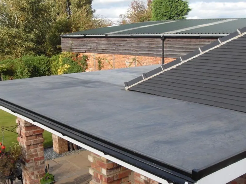 New flat roof over a brick pier car port