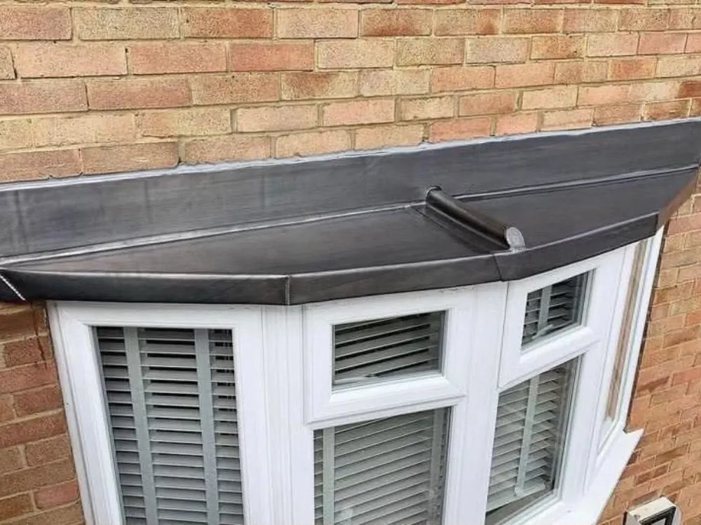 New lead bay roof above a bay window in Surbiton