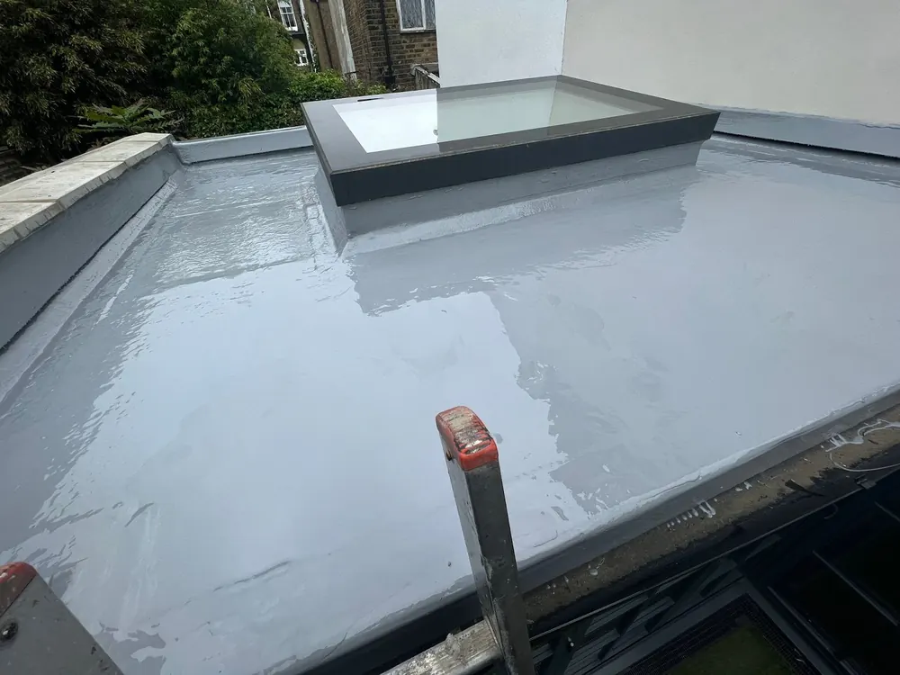 GRP fibreglass flat roof with a roof lantern