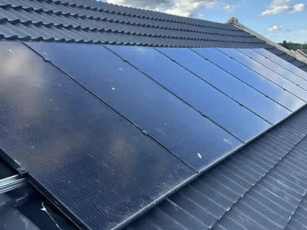 New black tiles with the solar panels back in place