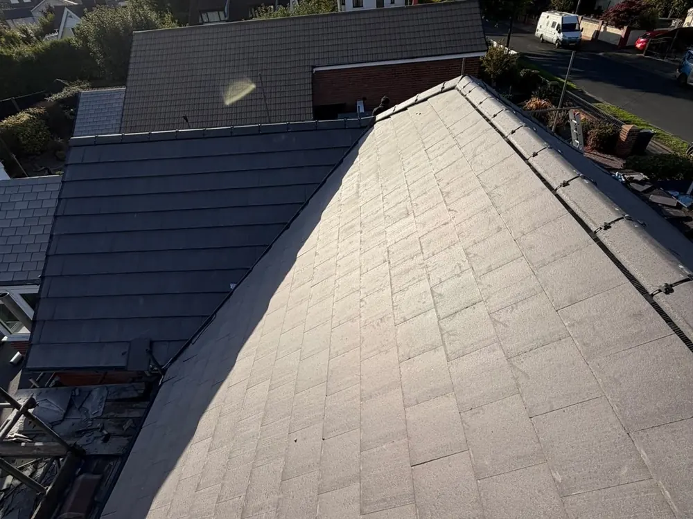 New grey tile hip and ridge on a finished bungalow re-roof
