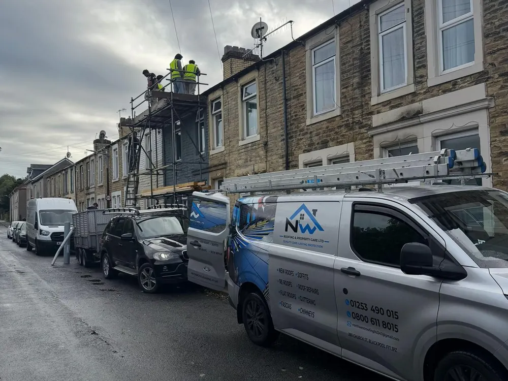 Morecambe terrace re-roof with the van and scaffold out front