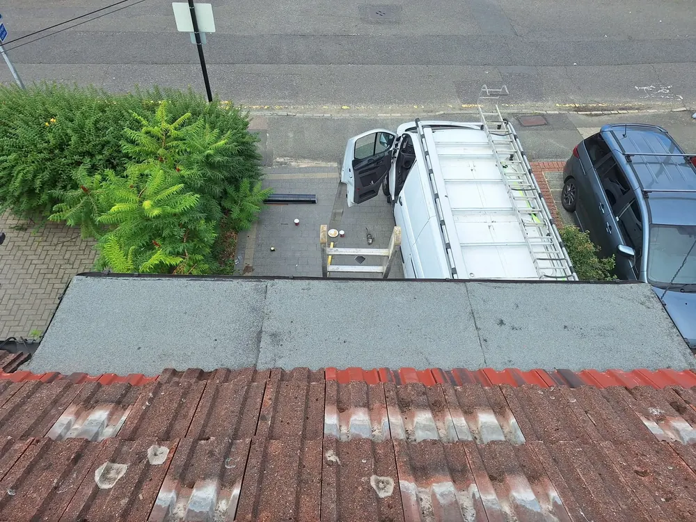 Finished felt flat roof seen from the roof above