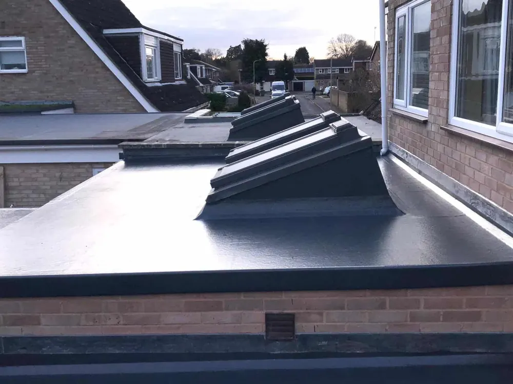 Flat roof with two roof lanterns