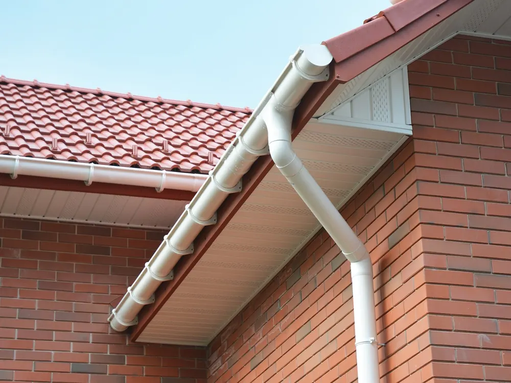 White uPVC fascia, soffit and gutter on a brick house