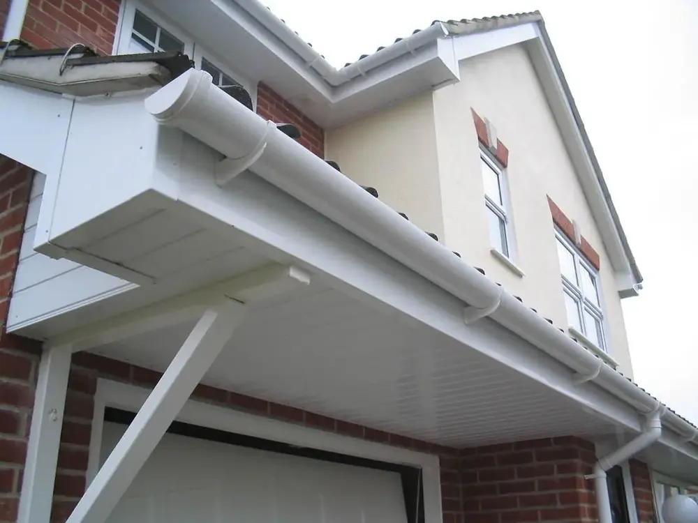 New white uPVC fascias, soffits and guttering on a rendered house